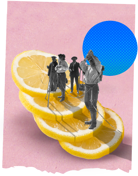 vintage explorers stood on top of a cut lemon